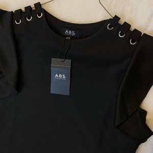 NWT BLACK DRESS SOZE XS BOUGHT AT DILLARDS STORE FOR $80 DETAILS ON SHOULDER